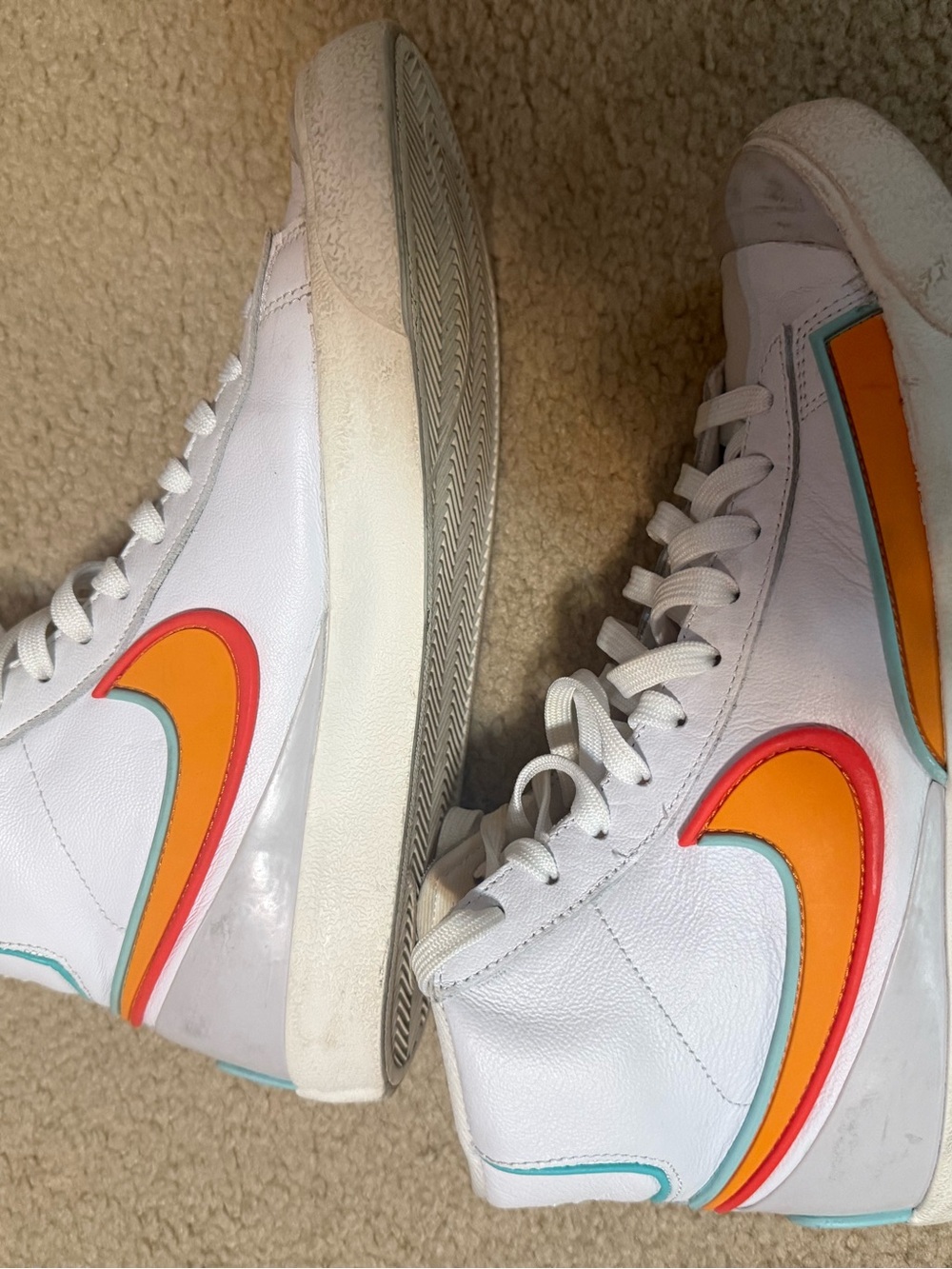 Nike Women’s White High-Top Sneakers with Orange and Teal Swoosh